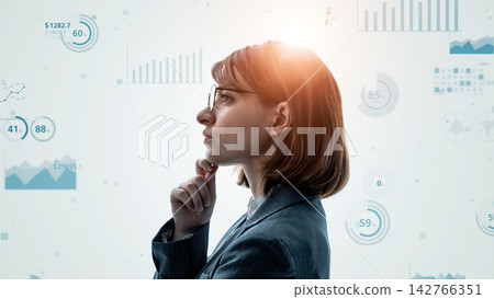 Thinking woman and statistical data concept Thinking woman and statistical data concept 142766351