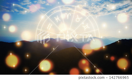 Astrology zodiac signs in the sky over mountains during sunset near a valley Astrology zodiac signs in the sky over mountains during sunset near a valley 142766965