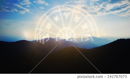 Astrology zodiac signs displayed against a mountain landscape at sunset Astrology zodiac signs displayed against a mountain landscape at sunset 142767073