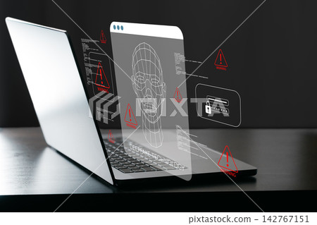 Deep fake technology shows warning signs on a laptop screen in a dark room 142767151