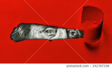 Dollar currency displayed on a red background with a tear showing part of a bill Dollar currency displayed on a red background with a tear showing part of a bill 142767296