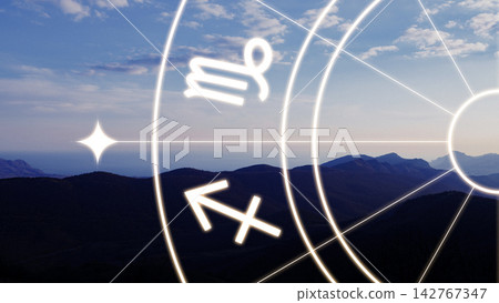 Astrology zodiac signs are displayed over a mountain landscape during the day Astrology zodiac signs are displayed over a mountain landscape during the day 142767347