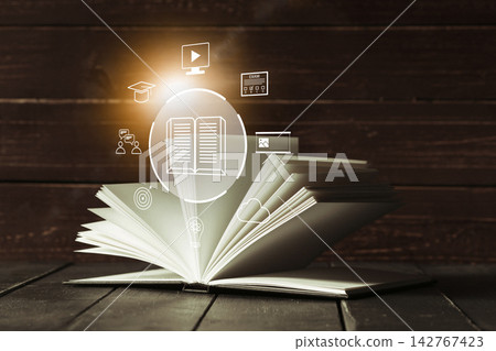 E learning concept with open book and digital icons showing study and online resources E learning concept with open book and digital icons showing study and online resources 142767423