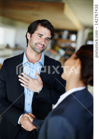 Businessman, woman and handshake in office for thank you or greeting, hello and hiring for recruitment for corporate job in management. People, shaking hands and agreement for b2b client partnership. 142767438