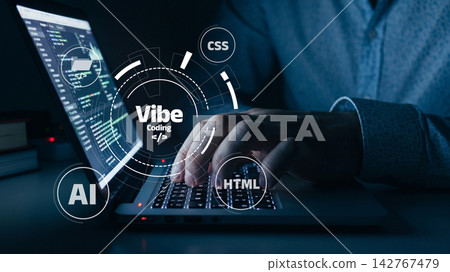 Working on vibe coding while using a laptop to write code in a dark room with visible programming languages Working on vibe coding while using a laptop to write code in a dark room with visible programming languages 142767479