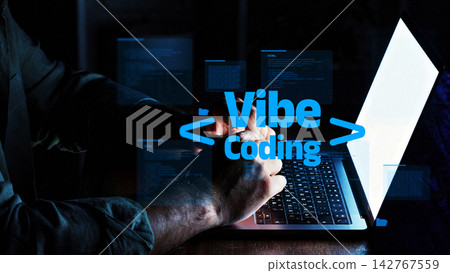 Vibe coding on a laptop at night with a focus on programming activities and digital design Vibe coding on a laptop at night with a focus on programming activities and digital design 142767559