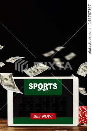 Sport betting display with cash flying around money and casino chips on a table Sport betting display with cash flying around money and casino chips on a table 142767567