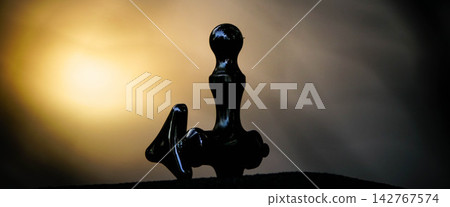 A solitary drinking fountain in a park at dusk in autumn. A solitary drinking fountain in a park at dusk in autumn. 142767574