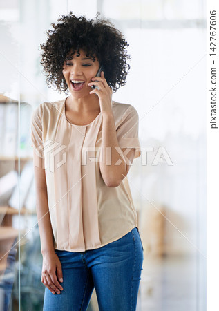 Consultant, happy and talk on phone call by window in office for excitement, crm and good news in workplace. African woman, chatting and surprised at firm for story, conversation and reaction Consultant, happy and talk on phone call by window in office for excitement, crm and good news in workplace. African woman, chatting and surprised at firm for story, conversation and reaction 142767606