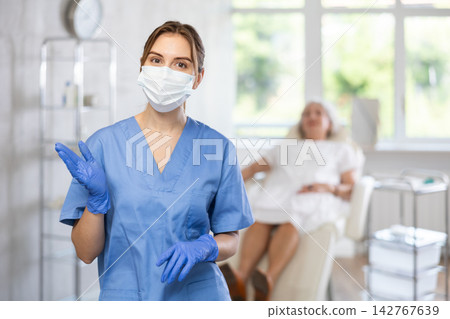 Young doctor with mask Young doctor with mask 142767639
