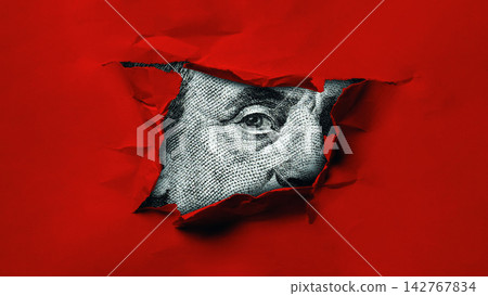 Peeking through a red surface to reveal a dollar bill design Peeking through a red surface to reveal a dollar bill design 142767834
