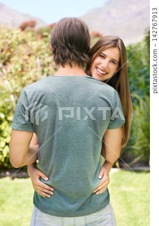 Couple, portrait and hug with love in garden for summer, romance and respect with affection or care for relationship. Man, woman and together in backyard for bonding or connection, trust and nature Couple, portrait and hug with love in garden for summer, romance and respect with affection or care for relationship. Man, woman and together in backyard for bonding or connection, trust and nature 142767913