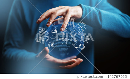 Hands reach out to interact with digital learning tools in a virtual environment 142767933