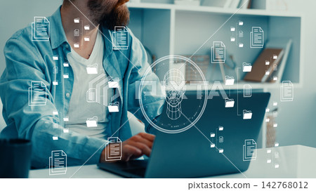 Working with deep fake technology in a modern office setting Working with deep fake technology in a modern office setting 142768012