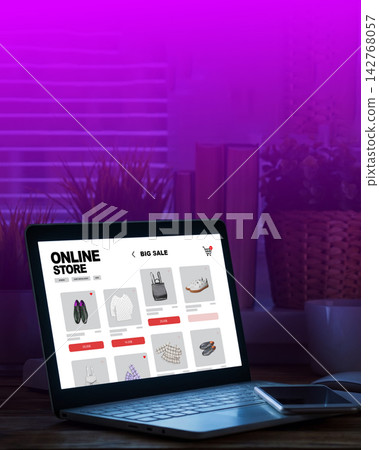 Online shopping experience at night on a laptop with focus on discounts and sale items Online shopping experience at night on a laptop with focus on discounts and sale items 142768057