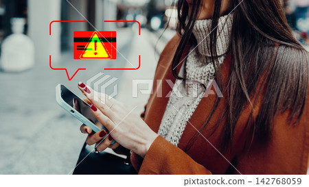 Warning about fake payment while using a smartphone on a city street Warning about fake payment while using a smartphone on a city street 142768059