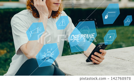 User explores deep fake technology on a smartphone while sitting in a park during daytime 142768978