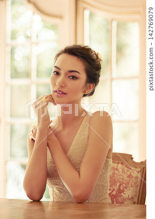 Woman, portrait and asian in luxury mansion with elegant clothes for wedding party. Bride, aristocratic home and thoughtful for fashion event, makeup and confidence waiting for guests or smiling Woman, portrait and asian in luxury mansion with elegant clothes for wedding party. Bride, aristocratic home and thoughtful for fashion event, makeup and confidence waiting for guests or smiling 142769079
