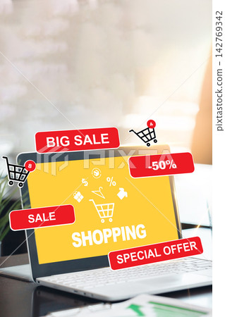 Online shopping with sale signs on a laptop at a desk during daytime Online shopping with sale signs on a laptop at a desk during daytime 142769342