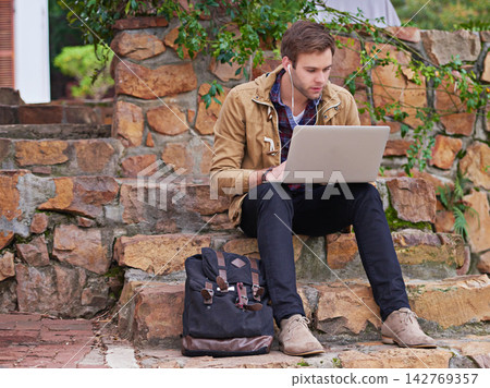 Student, thinking and typing for research on laptop, education and learning for project on computer. Man, email and browse for college application or bursary, study and campus or university studies Student, thinking and typing for research on laptop, education and learning for project on computer. Man, email and browse for college application or bursary, study and campus or university studies 142769357