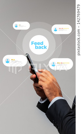 Feedback received through various online platforms is displayed around a person's hand using a smartphone Feedback received through various online platforms is displayed around a person's hand using a smartphone 142769479