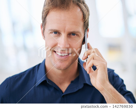 Portrait, happy man or phone call in home talking or speaking in living room for communication or chat. Smile, news and male person with mobile in conversation to relax in apartment or house on break Portrait, happy man or phone call in home talking or speaking in living room for communication or chat. Smile, news and male person with mobile in conversation to relax in apartment or house on break 142769830