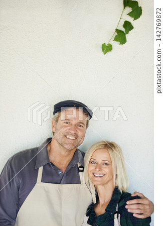 Studio, portrait and couple with apron, together and partnership in small business, growth and market. White background, man and woman with happiness for industry, owner and entrepreneur and career Studio, portrait and couple with apron, together and partnership in small business, growth and market. White background, man and woman with happiness for industry, owner and entrepreneur and career 142769872