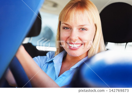 Portrait, woman and driving in car with excited for license exam, vacation travel or journey for solo holiday. Girl driver, auto transport and happy for vehicle purchase and new motor with test drive Portrait, woman and driving in car with excited for license exam, vacation travel or journey for solo holiday. Girl driver, auto transport and happy for vehicle purchase and new motor with test drive 142769873