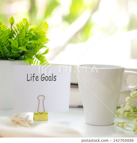 Notebook with my life goals message on notepad inspiring new beginnings and future life planning. Goal Life Wellness Concept. Notebook with my life goals message on notepad inspiring new beginnings and future life planning. Goal Life Wellness Concept. 142769886