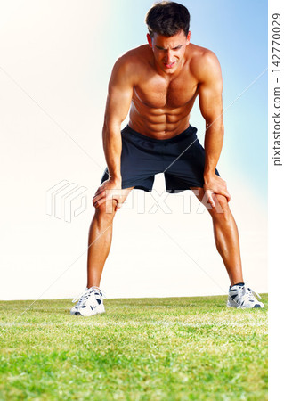 Man, exercise and tired rest for running workout or blue sky nature for training wellness, cardio or grass field. Male person, relaxing and exhausted for fitness sport or marathon, health or fatigue Man, exercise and tired rest for running workout or blue sky nature for training wellness, cardio or grass field. Male person, relaxing and exhausted for fitness sport or marathon, health or fatigue 142770029