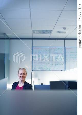 Business, cubicle and portrait of woman in office for planning, consulting and human resources. Corporate, professional and person in coworking workspace for insurance company, agency and startup Business, cubicle and portrait of woman in office for planning, consulting and human resources. Corporate, professional and person in coworking workspace for insurance company, agency and startup 142770183