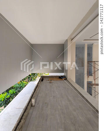 Interior balcony corridor under construction Interior balcony corridor under construction 142771117