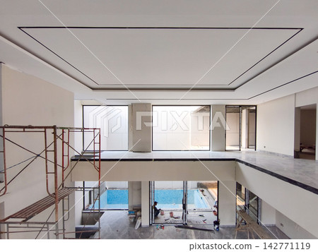Two story modern luxury house interior under construction Two story modern luxury house interior under construction 142771119