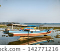 Traditional Wooden Boat Anchored 142771216