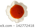 Spicy sauce in white flower-shaped bowl on plain background 142772418