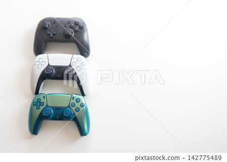 Three game controllers Three game controllers 142775489