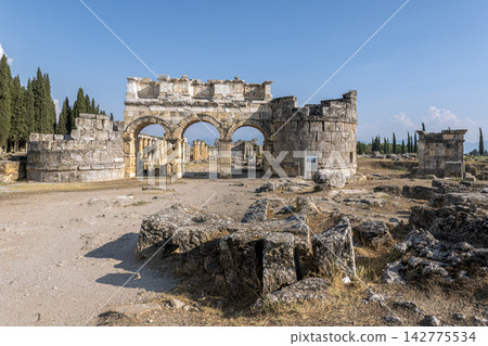 Frontinus Gate of the ancient city of Hierapolis in Pamukkale Frontinus Gate of the ancient city of Hierapolis in Pamukkale 142775534
