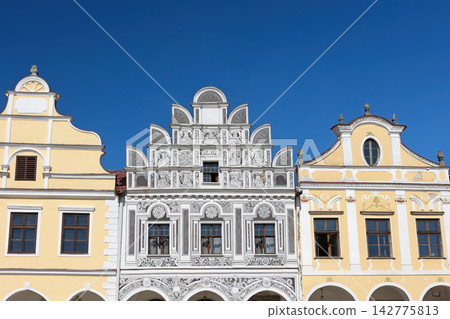 Beautiful facade of the colorful baroque houses in the town of Telc. Czech Republic. Beautiful facade of the colorful baroque houses in the town of Telc. Czech Republic. 142775813