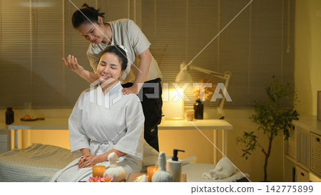 Massage professional shoulder massage female client Massage professional shoulder massage female client 142775899