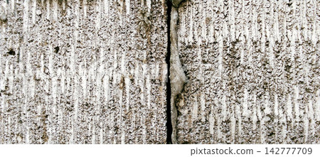 Textured Concrete Blocks Joined by Mortar Seam Textured Concrete Blocks Joined by Mortar Seam 142777709