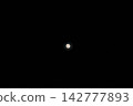 A beautiful full moon floating in the pitch-black darkness 142777893