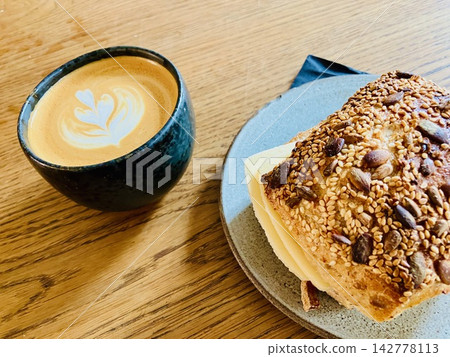 Sourdough bread with flat white and cheese Sourdough bread with flat white and cheese 142778113