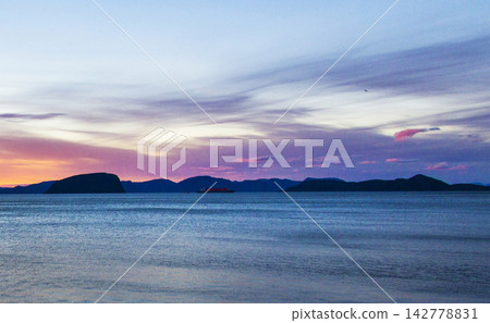 sunset over the sea sunset over the sea 142778831