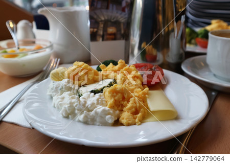 Hotel Breakfast Plate with Scrambled Eggs and Cottage Cheese Hotel Breakfast Plate with Scrambled Eggs and Cottage Cheese 142779064
