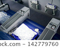 Warsaw, Poland, May 10 2018: Premium economy seat with blanket and pillow prepared for passengers 142779760