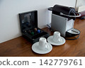 Wroclaw, Poland, June 15, 2018: Coffee capsule machine with cups in luxury hotel room 142779761