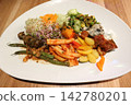 Assorted Mediterranean Gourmet Salad Platter on Wooden Surface 142780201