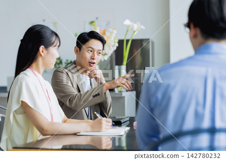 Middle-class engineer working in an office Middle-class engineer working in an office 142780232