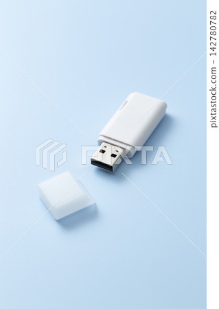 USB memory stick on a blue background USB memory stick on a blue background 142780782