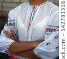 Woman in ukrainian embroidery shirt 142781318